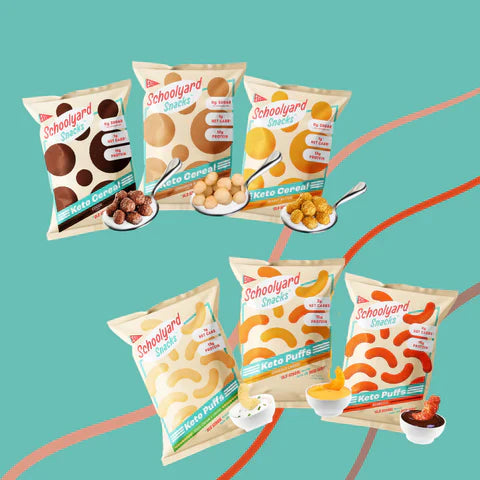 Assortment of Schoolyard Snacks’ gluten-free protein puffs and cereals displayed against a bright blue background.